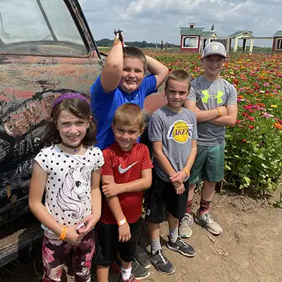 kids in the zinnia flower patch