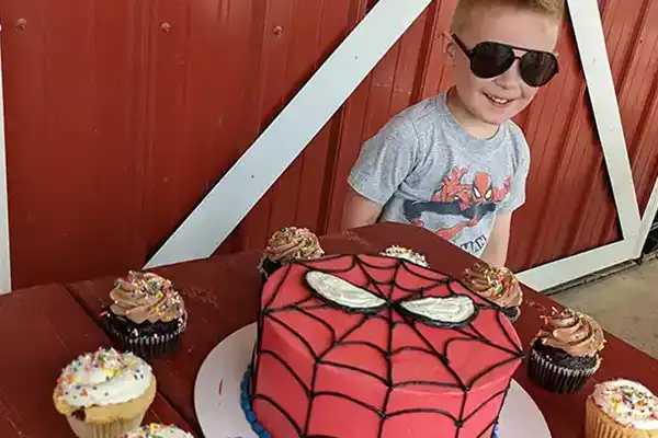 birthday cake and boy at Schusters Farm