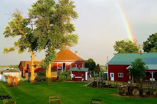 farm scene with rainbow